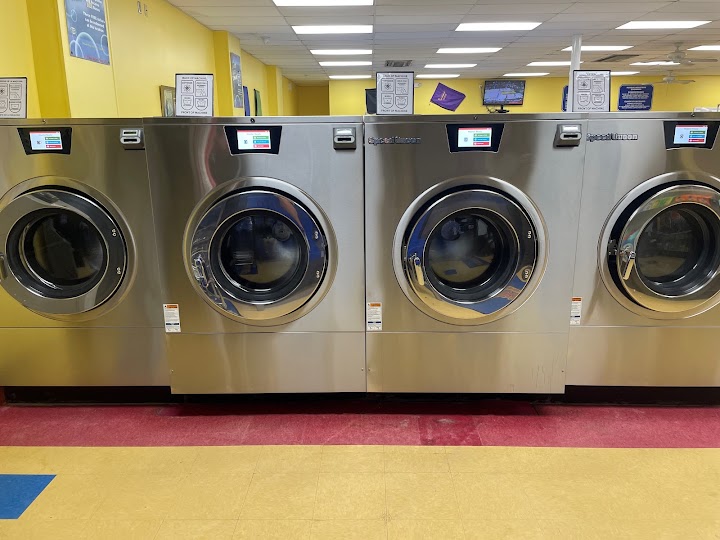 Laundry mat dry cleaners storefront photo from Google