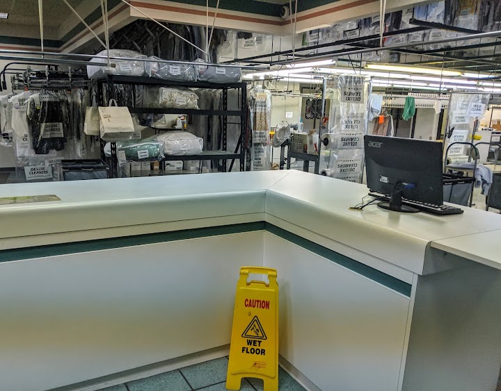 Deluxe Cleaners storefront photo from Google