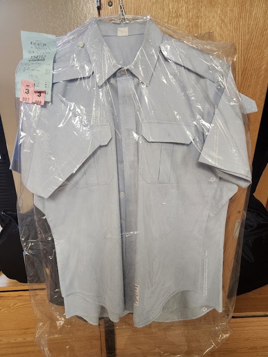 USCG Dry Cleaners storefront photo from Google