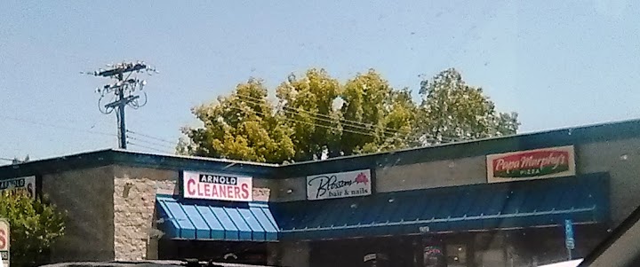 Arnold Dry Cleaners storefront photo from Google