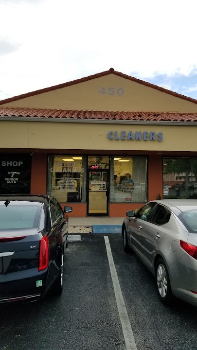 Deluxe Cleaners storefront photo from Google
