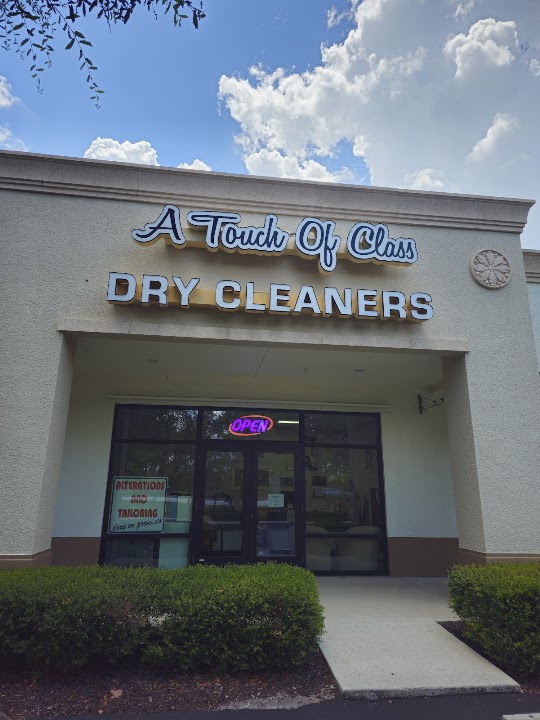 A Touch of Class Dry Cleaners storefront photo from Google