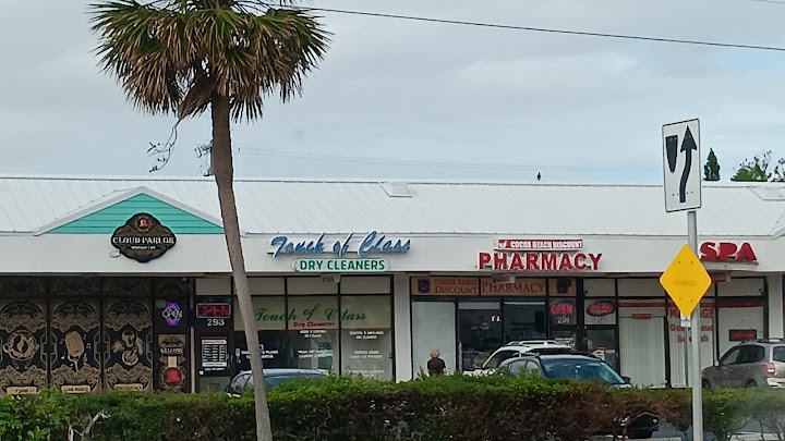 Touch of Class Dry Cleaners storefront photo from Google