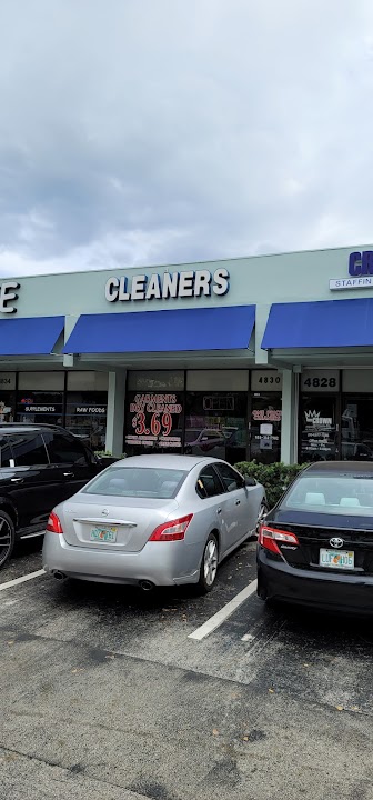 One price cleaners storefront photo from Google