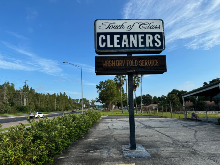 Touch of Class Dry Cleaners storefront photo from Google
