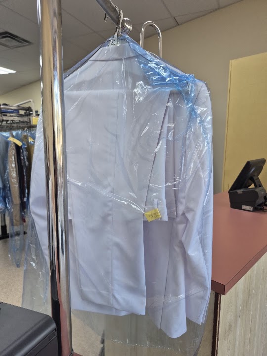 Sunset dry Cleaners storefront photo from Google