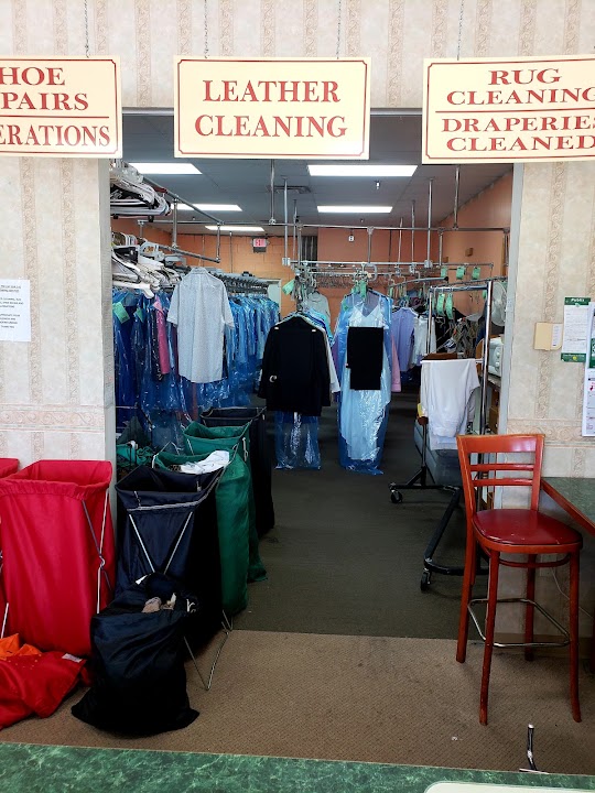 American cleaners storefront photo from Google