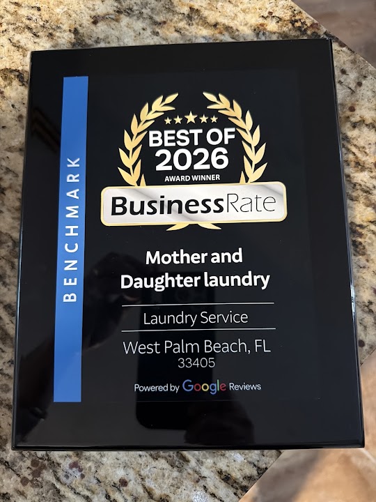 Mother and Daughter laundry storefront photo from Google