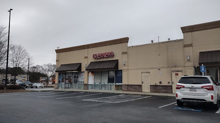 white collar dry cleaners storefront photo from Google