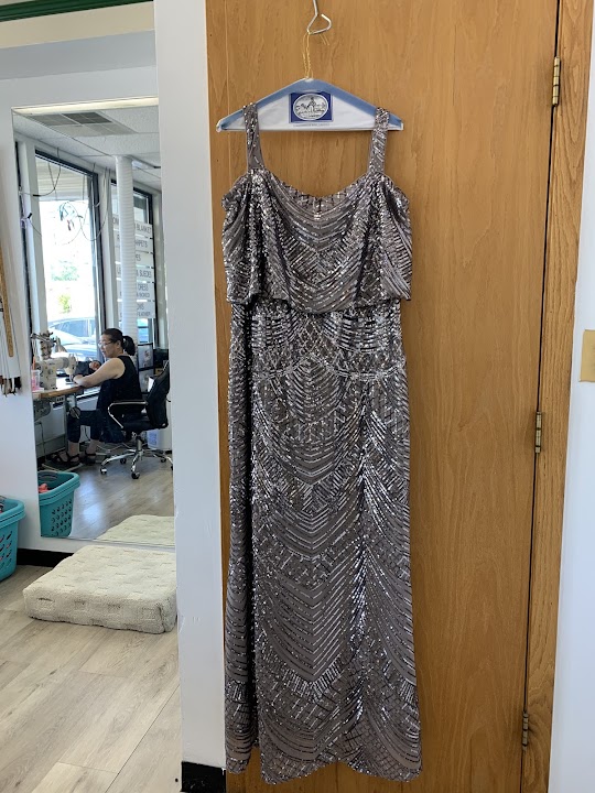 Top Dry Cleaning storefront photo from Google
