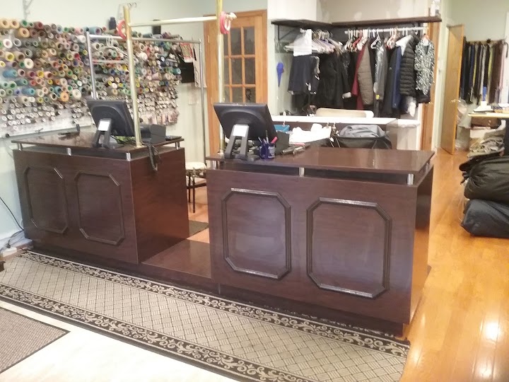 Parisian Dry Cleaners storefront photo from Google