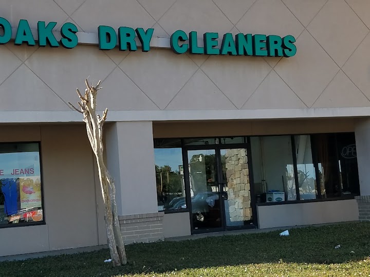 Oaks Dry Cleaners storefront photo from Google
