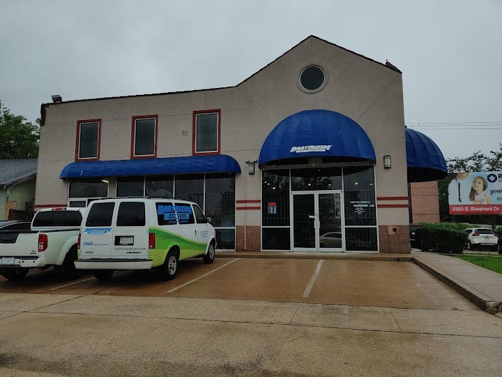 Dry cleaner storefront photo from Google