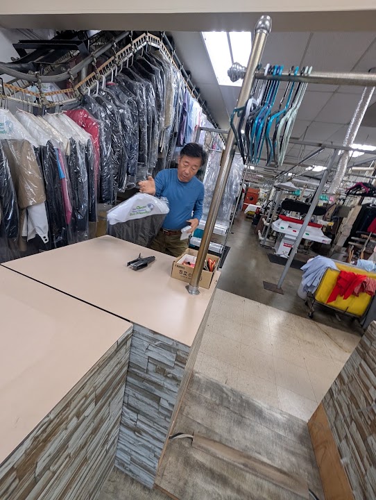 Q Cleaners storefront photo from Google